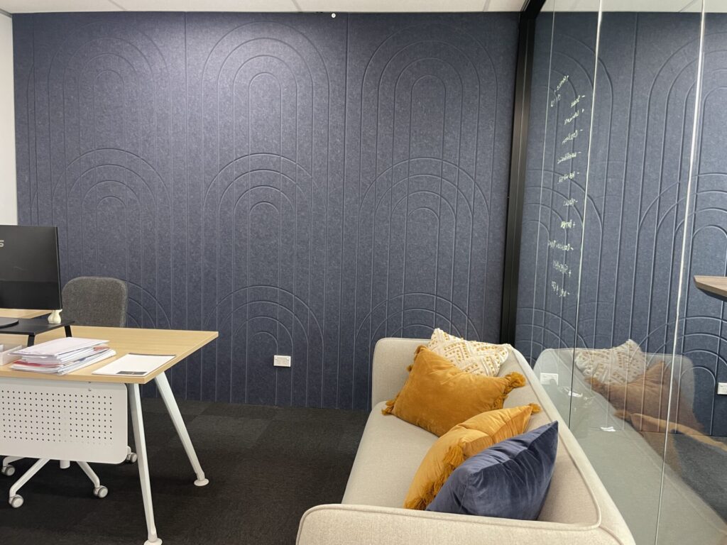 Meeting rooms, bespoke timber panelling and welcoming reception area for this office fit out for Parramatta Design Studio