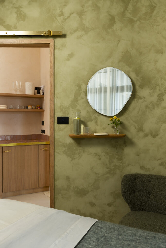 Bespoke curved wall features, sheer curtains and neutral colour palette with green and pink pops for this wellness & beauty fit out for Face Up, Total Fitouts Auckland Central